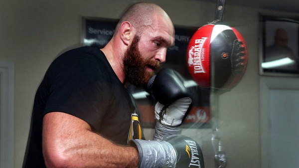 Don’t panic. As it turns out, the reigning /WBA/WBO/IBO heavyweight champion isn’t planning to retire. (Photo: Courtesy)